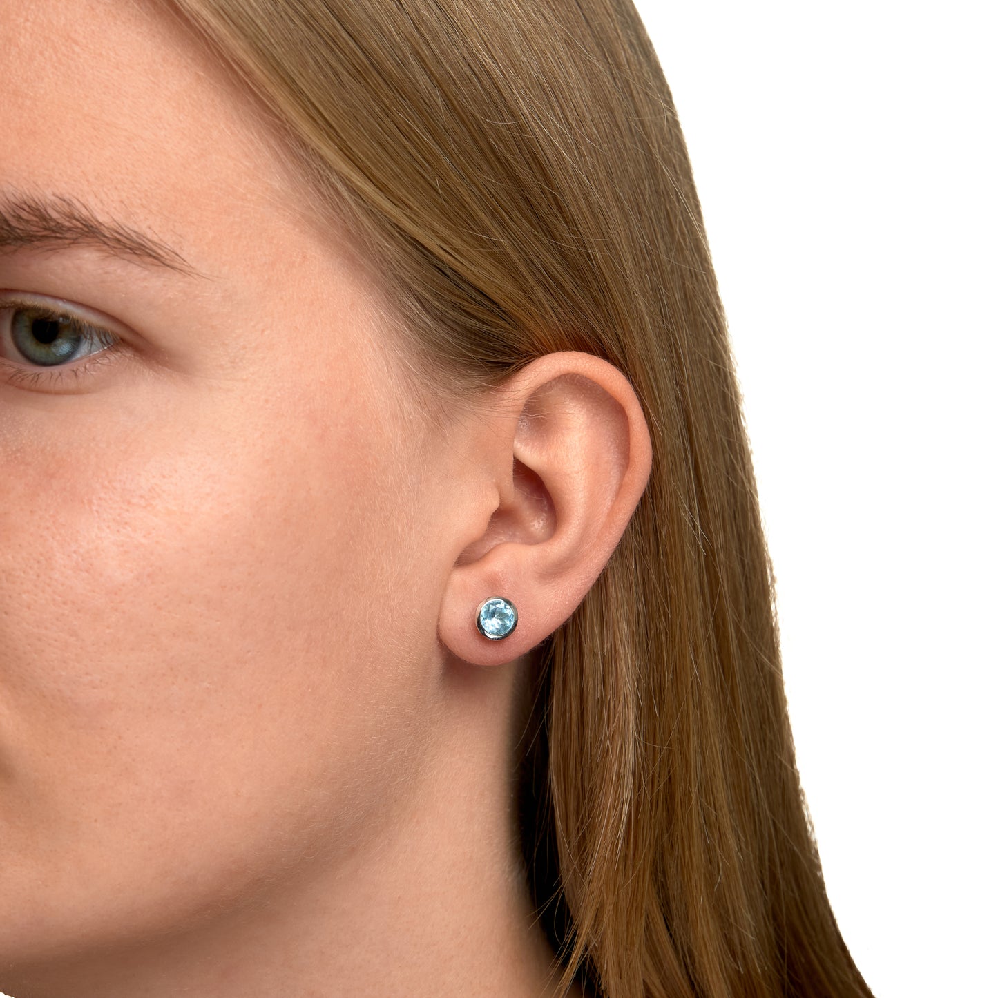 Ohrringe 925/- Sterling Silber rhodiniert 0,75cm Blautopas beh.