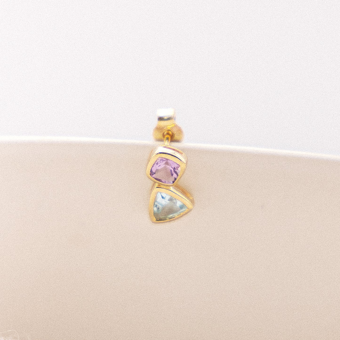 Ohrringe 375/- Gold 1,3cm Blautopas beh.