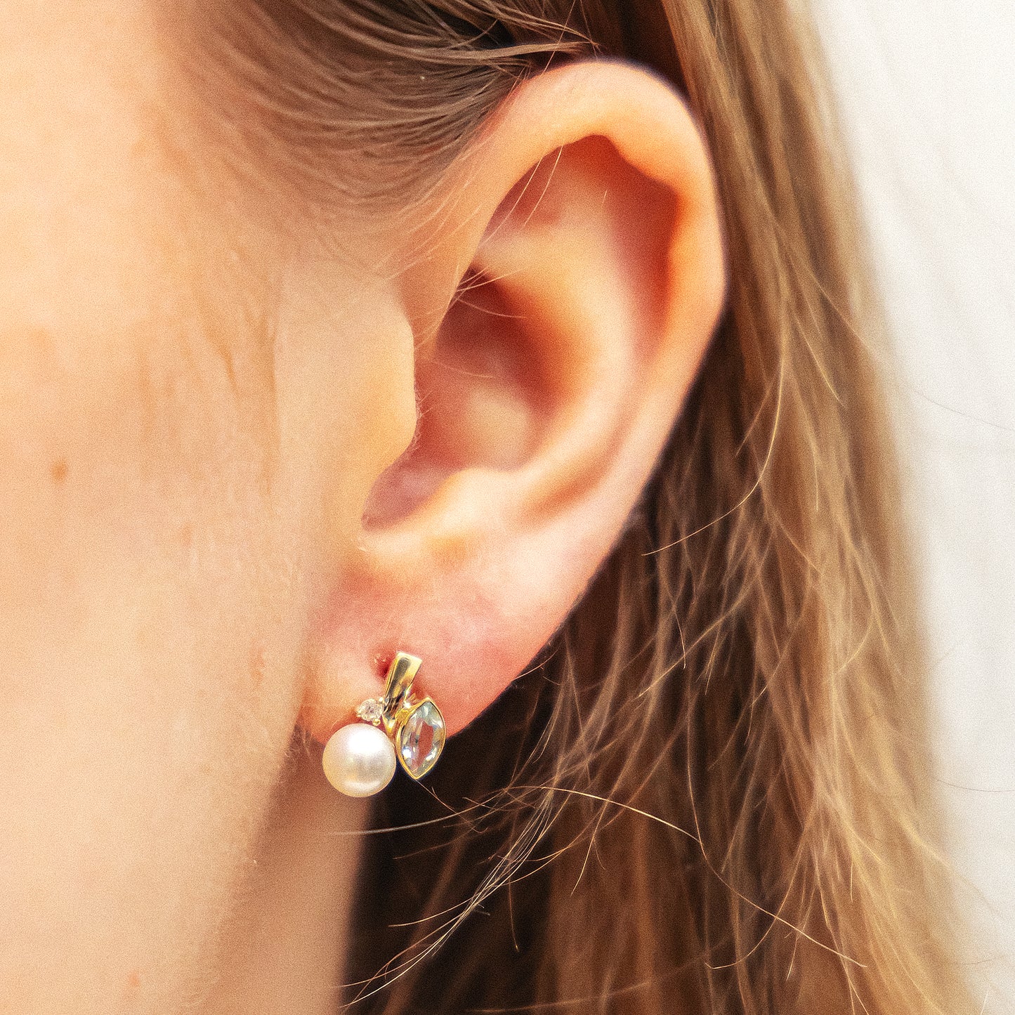 Ohrringe 375/- Gold 1,3cm Blautopas beh.