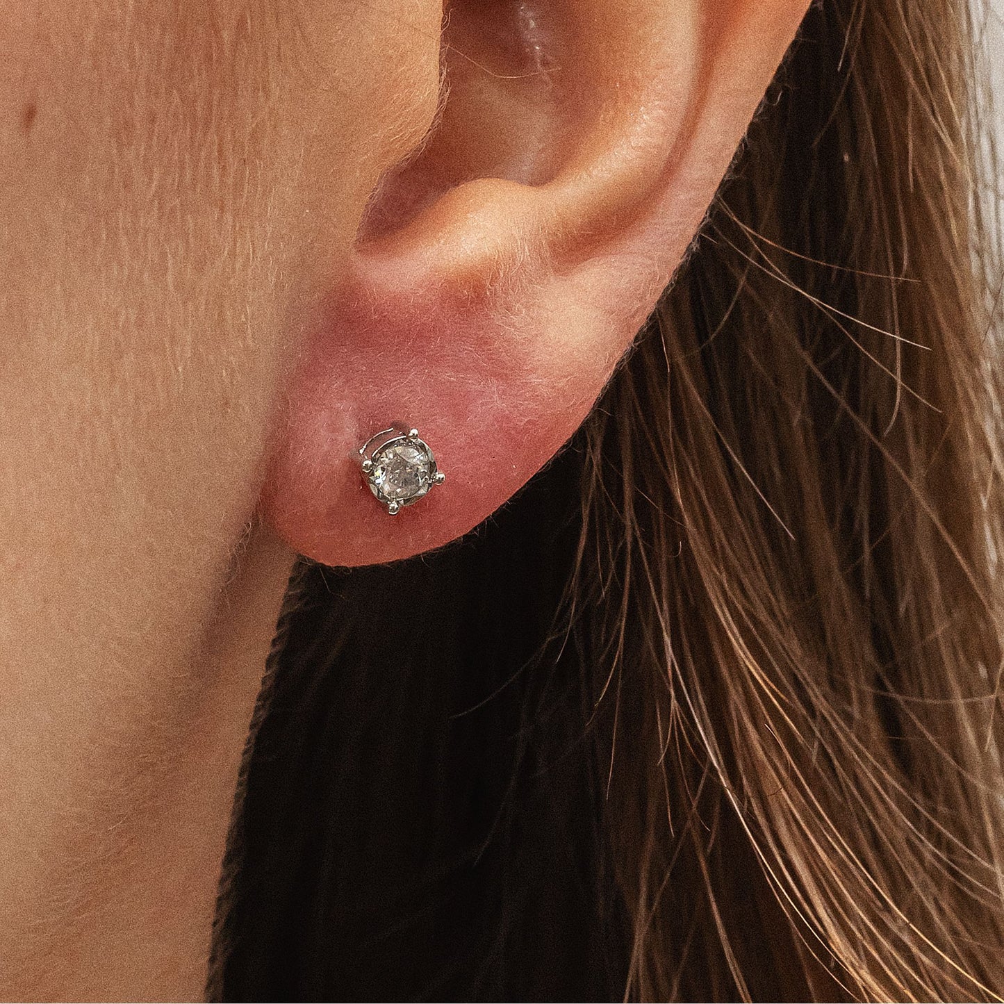 Ohrstecker 333/- Gold rhodiniert 0,6cm Brillant 0,02ct.