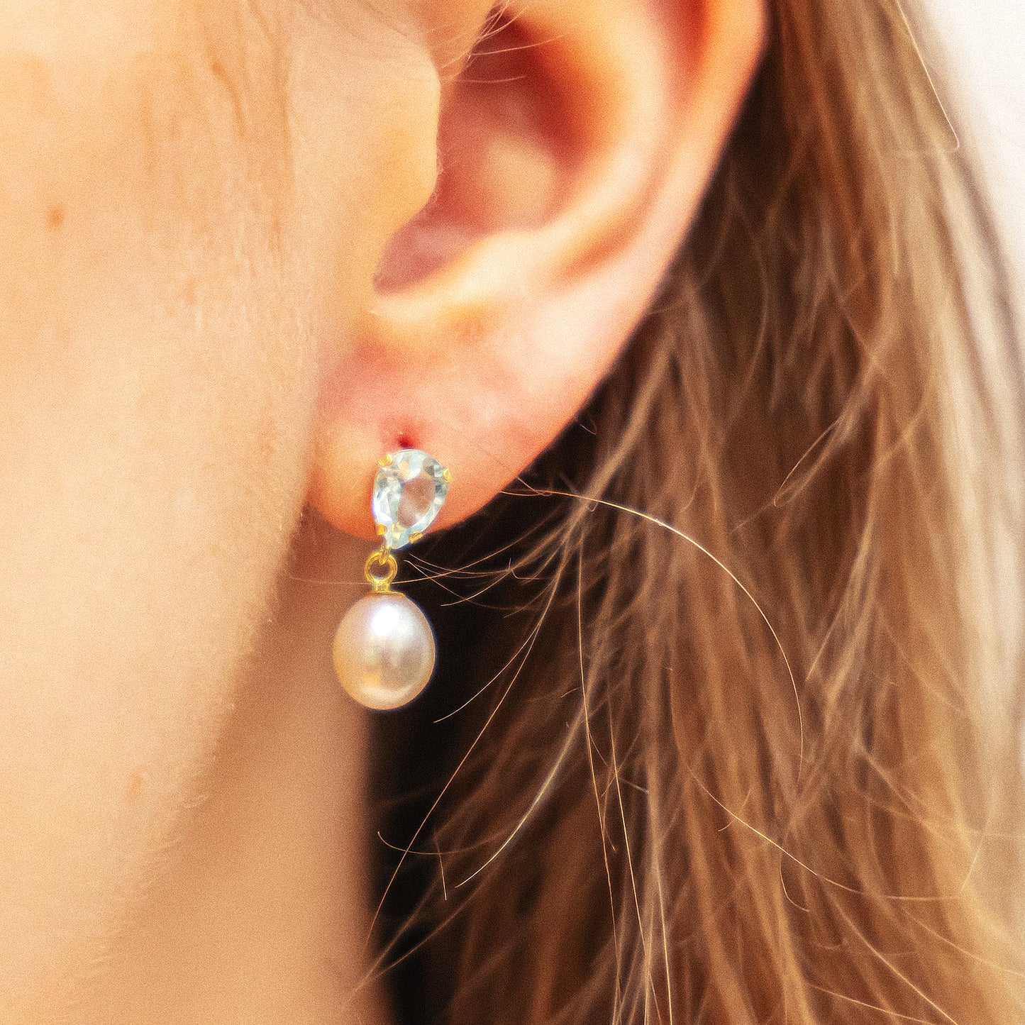 Ohrringe 333/- Gold 1,8cm Blautopas beh.
