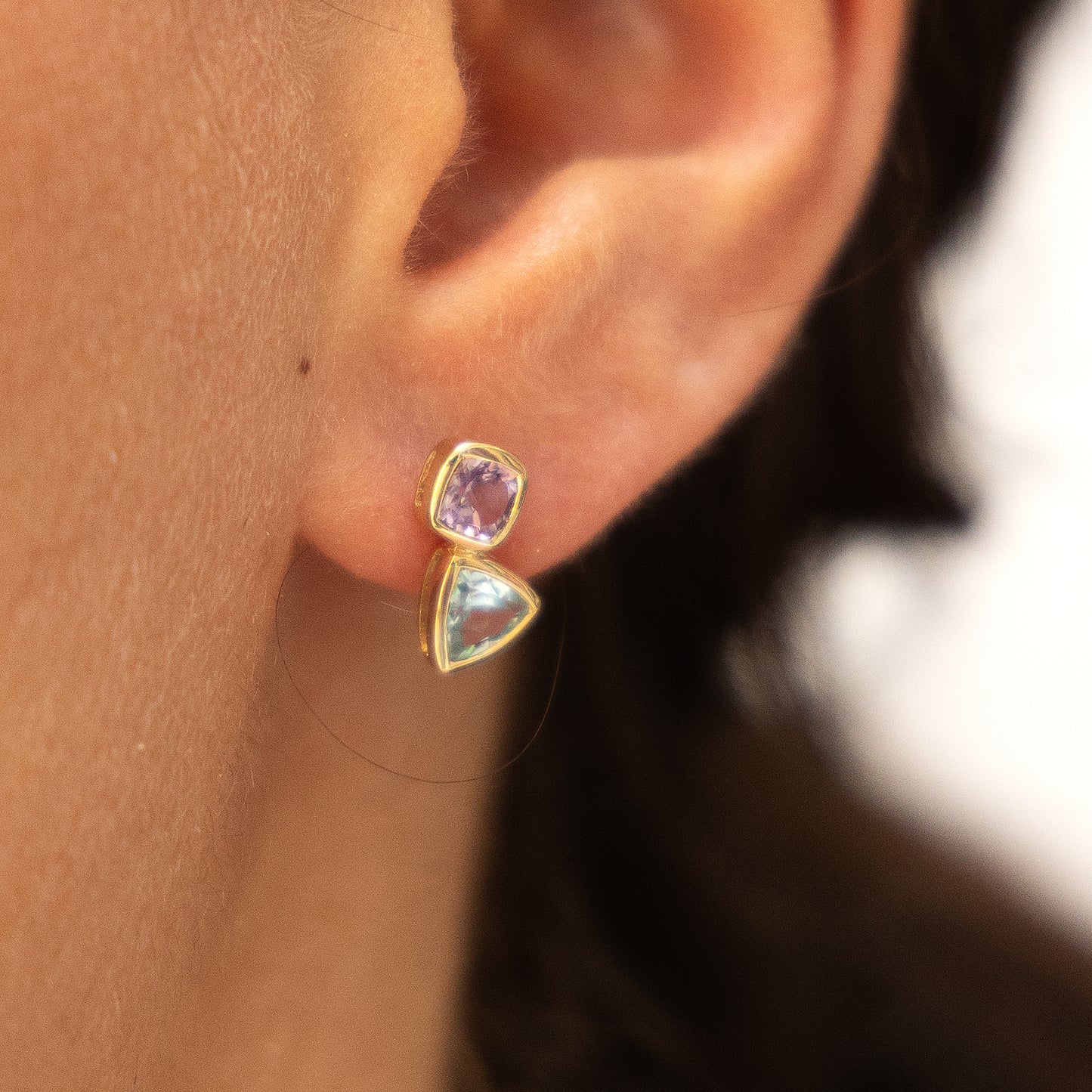 Ohrringe 375/- Gold 1,3cm Blautopas beh.