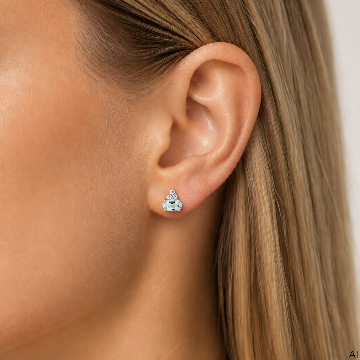 Ohrstecker 375/- Gold vergoldet 0,6cm Blautopas beh.