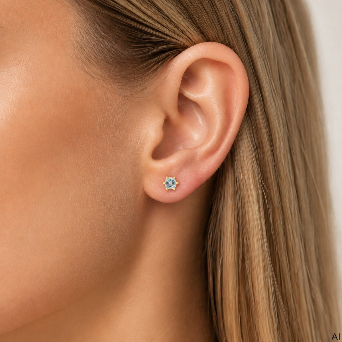 Ohrstecker 375/- Gold vergoldet 0,5cm Blautopas beh.